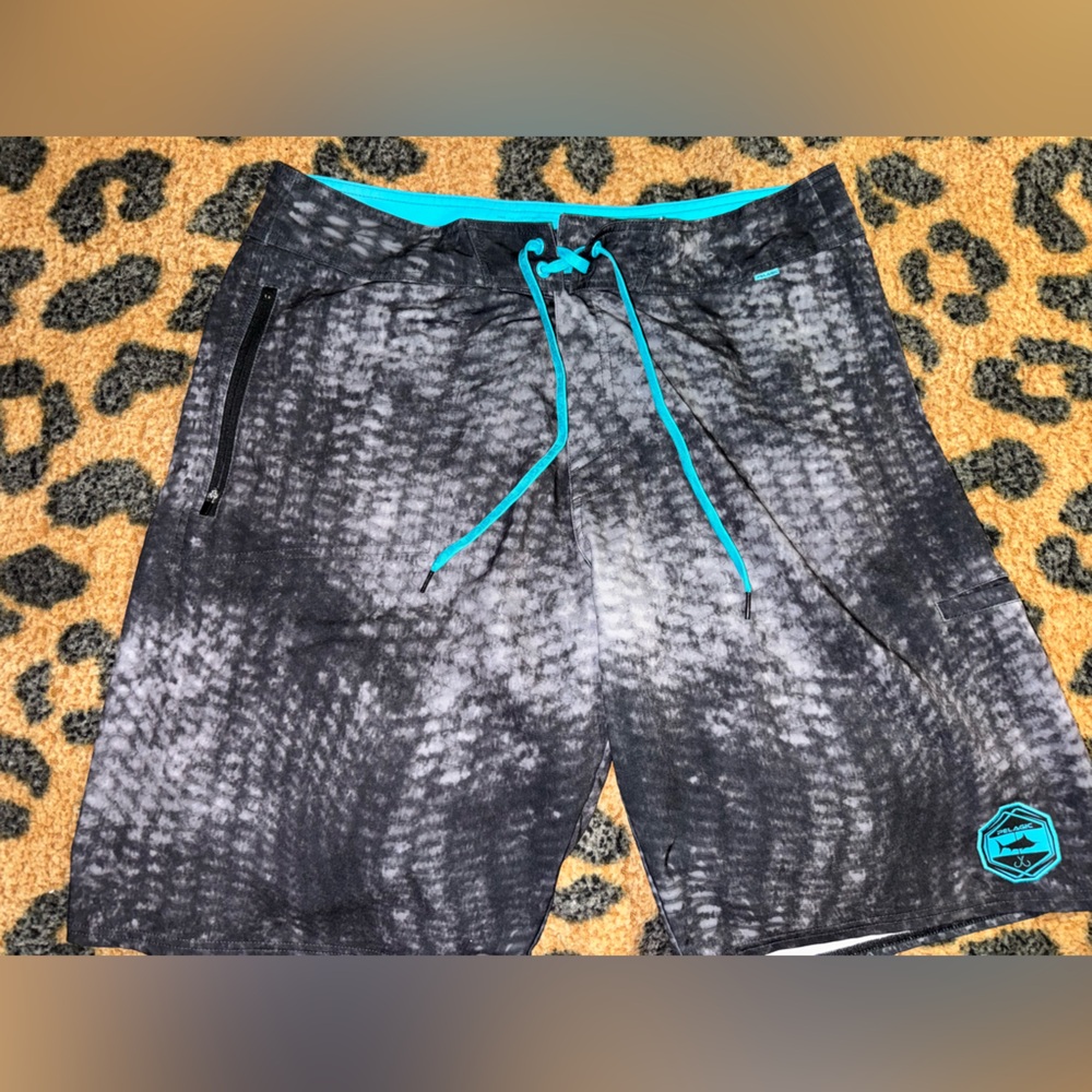 Pelagic Black and Blue Board Shorts Swimwear